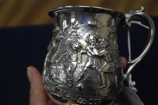 A Victorian embossed silver christening mug, George Angel, London, 1859, 12cm.